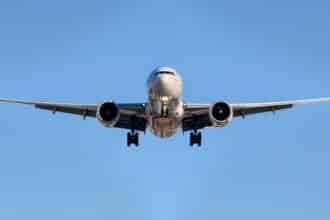 airplane in midair at daytime