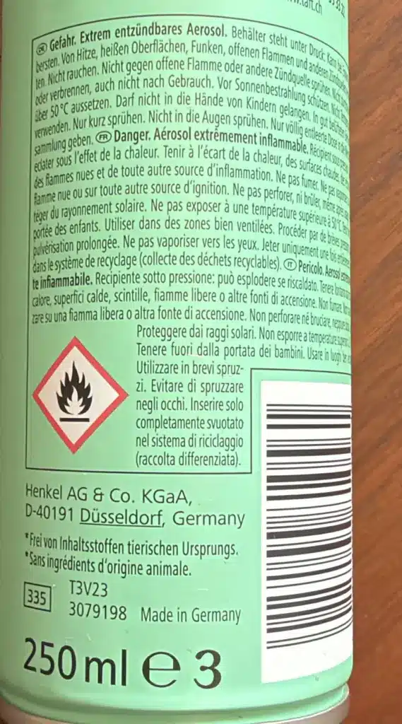 Rückseite einer Taft Haarspraydose mit Gefahrenhinweis, Flammensymbol und der Angabe 250 ml